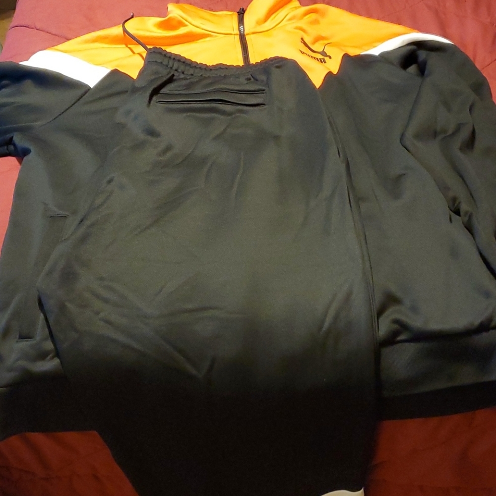 3x orange and black puma joggers